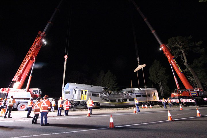 Crushed train being removed